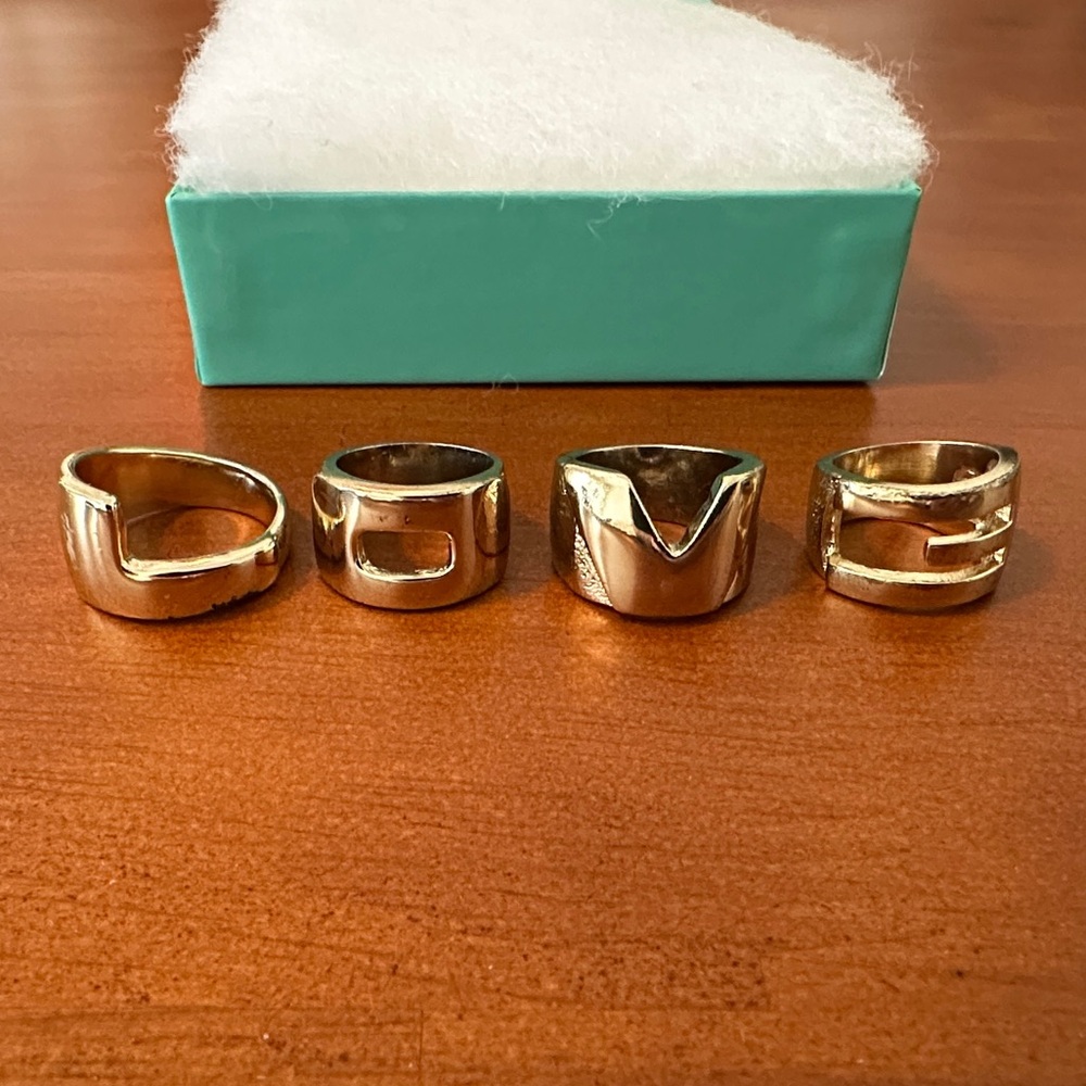 Melody Eshani “Love” Rings